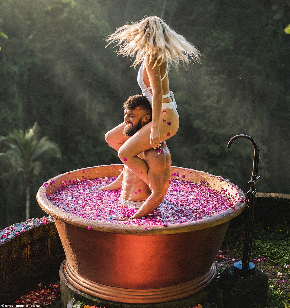 Ruan, 28, and Lee-Chazelle, 23, sold everything they own to travel together full-time and are now posting stunning photography online.  Here they are pictured at the breathtaking Villa Cella Bella in Ubud, Bali