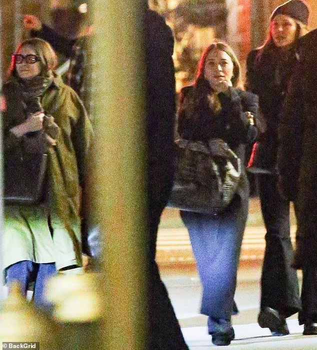 Ashley Olsen (left), her twin brother Mary-Kate (center) and their younger sister Elizabeth Olsen (right) were spotted on a rare outing in New York on Tuesday