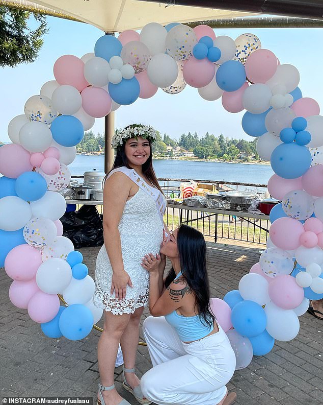 Audrey Fualaau celebrated sister Georgia's pregnancy by kissing her baby bump during a gender reveal party in August