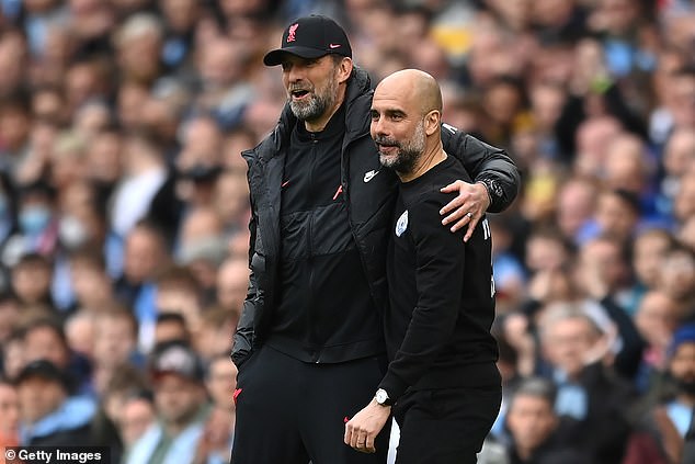 Leading managers are reportedly calling for a radical rule change that will see clubs only be able to sack them during the transfer window.  Pictured are Jürgen Klopp and Pep Guardiola