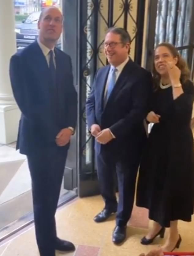 Prince William is greeted today by Rabbi Daniel Epstein and his wife Illana