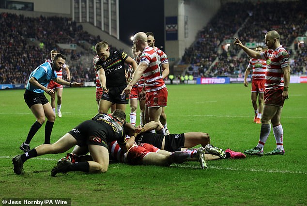 Jake Wardle appeared to be taken down well before the line (photo)