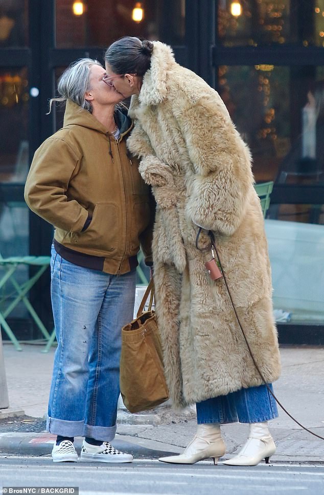 Jenna Lyons shared a sweet kiss with her partner Cass Bird during a walk together in New York City