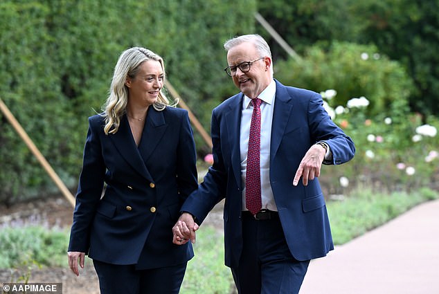 Anthony Albanese (pictured with fiancé Jodie) that the coalition overtakes Labor for the first time since the 2022 election