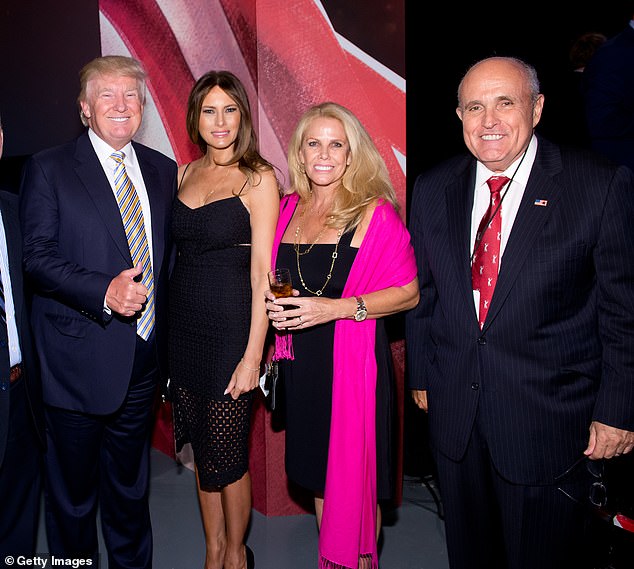 Donald Trump, Melania Trump and Rudy Giuliani attend the US Ryder Cup Captain's Picks News Conference on September 2, 2014 in New York City