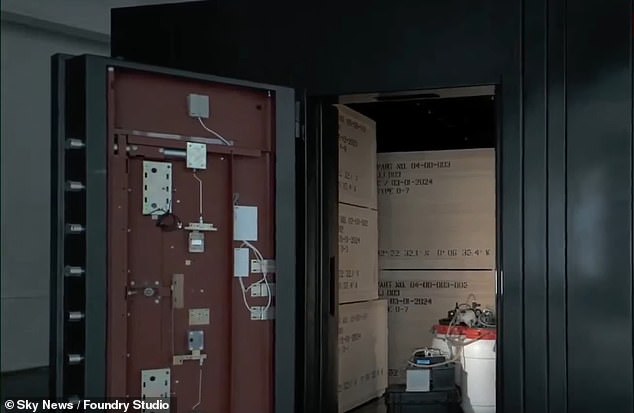 The works of art, he claims, are stored in a 29-ton safe containing an 'extremely corrosive' substance