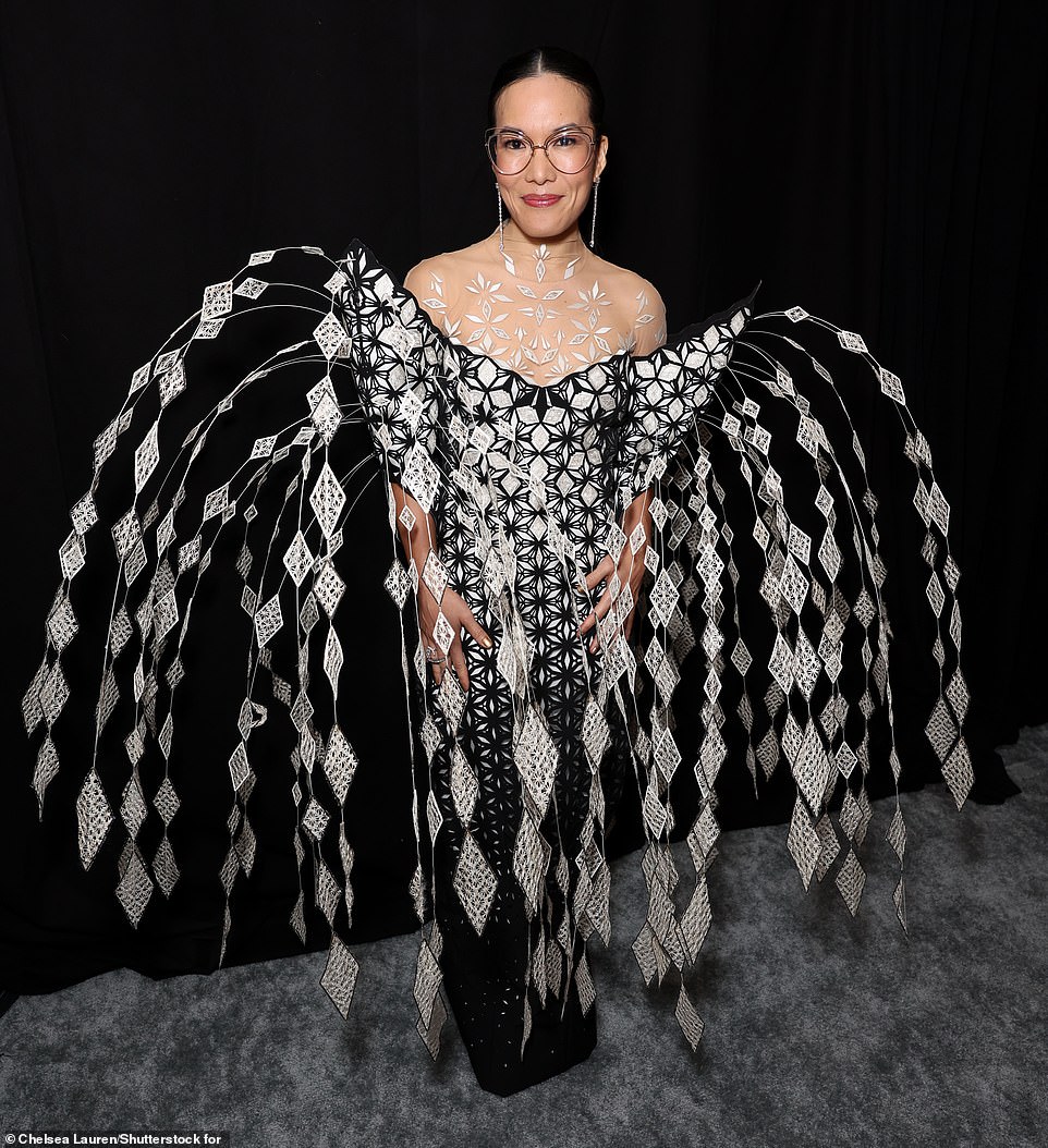 Ali Wong made a rather stunning appearance on the SAG Awards red carpet in a huge dress with diamond-shaped embellishments flying down the sides - making the comedian look little different from a pigeon