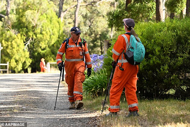 Victoria Police confirmed on Wednesday evening that the search would end at nightfall, but would resume at first light on Thursday morning (pictured, SES staff searching a property)