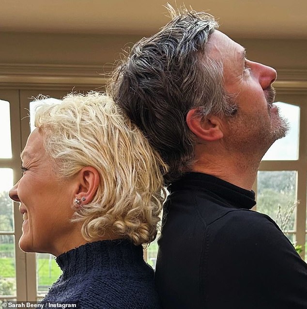 Sarah Beeny showed off her curly blonde locks as she posed for an Instagram photo with husband Graham on Sunday amid her battle with breast cancer