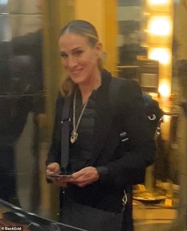 She cut a stylish figure in a black ensemble as she showed off her beautiful smile despite receiving numerous scathing reviews for her West End play