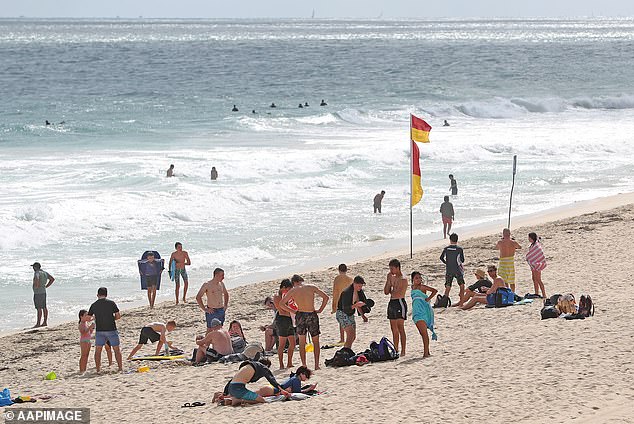 Emergency services were called to Scarborough Beach, in Perth's coastal suburb of Scarborough, about 8.20am on Sunday after a 46-year-old man was pulled unconscious from the water (pictured from Scarborough Beach)