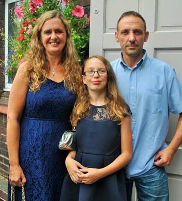 Scarlett pictured with her parents Emma, ​​a teacher, and Brian, a trader