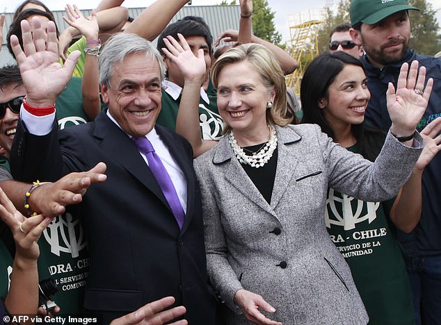 Sebastian Pinera, then President-elect of Chile, is seen with then Secretary of State Hillary Clinton in Santiago in March 2010, following a massive earthquake