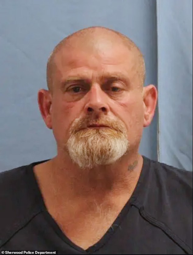 Timothy Caudle (pictured), 58, is accused of trying to kidnap the toddler from her mother Mikayla Ferguson's car Monday evening while it was parked outside a Walmart Superstore in Sherwood, Arkansas.