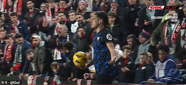 The Sevilla winger protested to the referee after the incident