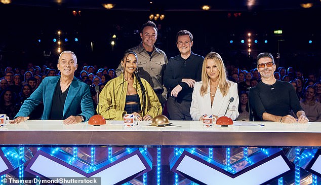 Simon and fellow BGT judges Alesha Dixon, Bruno Tonioli and Amanda Holden, along with presenters Ant McPartlin and Declan Donnelly, returned to filming for the new series last month (front row: judges Bruno, Alesha, Amanda and Simon. Back row: presenters Ant and December)