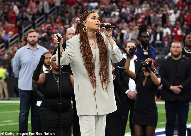 Andra Day performed the black anthem 'Lift Every Voice and Sing' during the Super Bowl