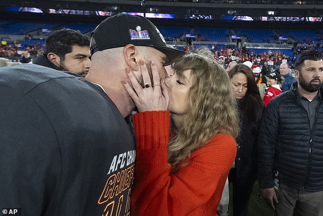 Millions of Americans are expected to call in sick the Monday after the Super Bowl as record numbers are tipped to watch the 'Taylor Bowl' (Photo: Kansas City Chiefs Travis Kelce and Taylor Swift kiss on January 28)