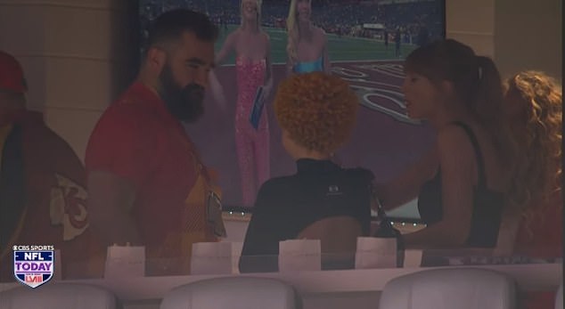 Jason is seen chatting with Swift and rapper Ice Spice from a luxury suite in Las Vegas