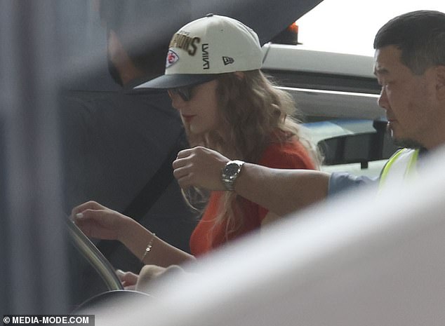 Taylor Swift was spotted wearing her and Travis Kelce's custom TNT bracelet in Australia