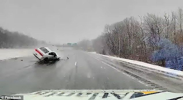 Massachusetts ambulance driver Tim Crosbie narrowly avoided a rollover car while transporting a patient along Interstate 95 in Peabody.  When a white sedan came rolling down the highway, Scobie was forced to quickly turn right to avoid it.