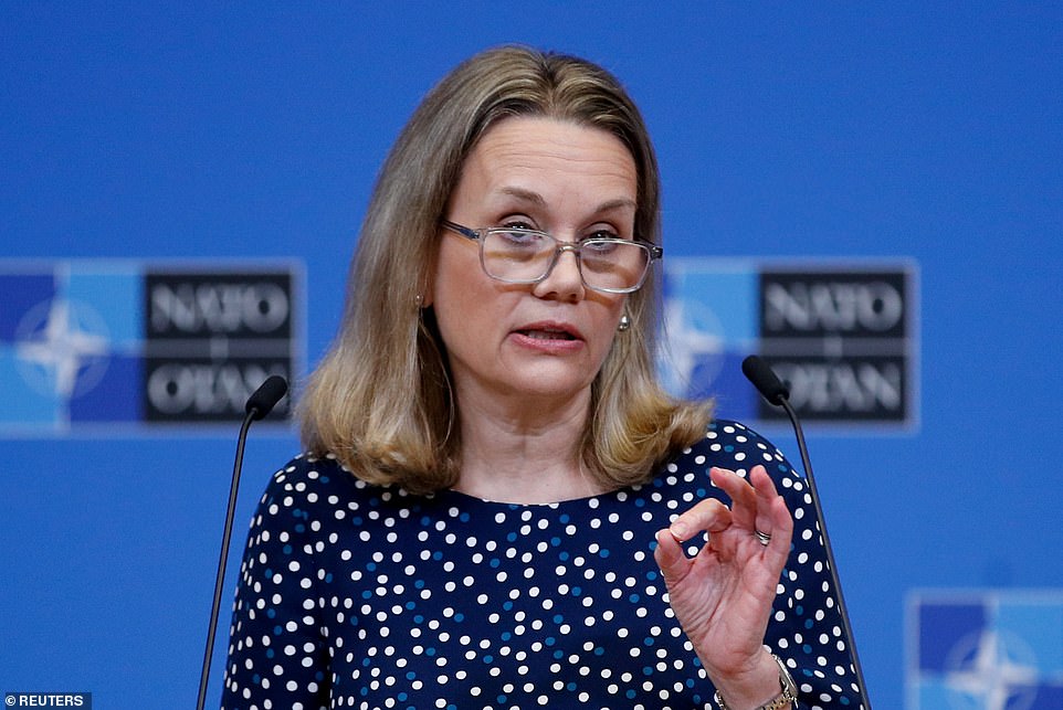 Donald Trump's latest threat against NATO is irrational and endangers US troops and allies, US Ambassador to NATO Julianne Smith (pictured) said on Tuesday.