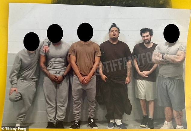 The photo, believed to have been taken on December 17, shows Bankman-Fried with a beard next to former inmate G Lock, an ex-gang member.