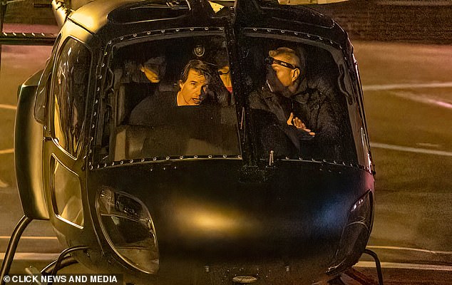 The actor, 61, returned to Battersea after spending the day in Longcross in Surrey filming Mission Impossible