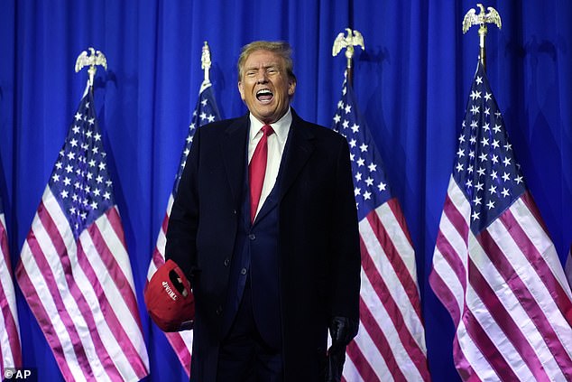 Republican presidential candidate and former President Donald Trump shouts at the podium during a campaign rally in Waterford Township, Michigan, on February 17, 2024