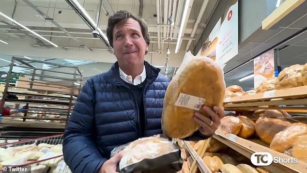 Tucker Carlson in a Russian supermarket as he frowned at the low price for 'fresh groceries'