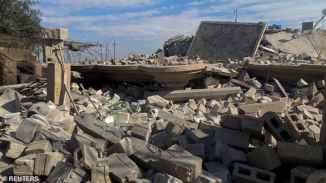 The Pentagon unleashed a volley of missiles on Iranian-backed militias on Friday evening.  Here you can see the ruins of a building in Iraq.