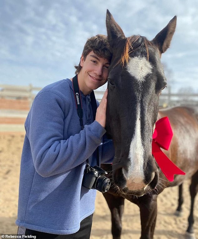 Fielding shot what he loved with his camera and next to a horse in this sweet photo