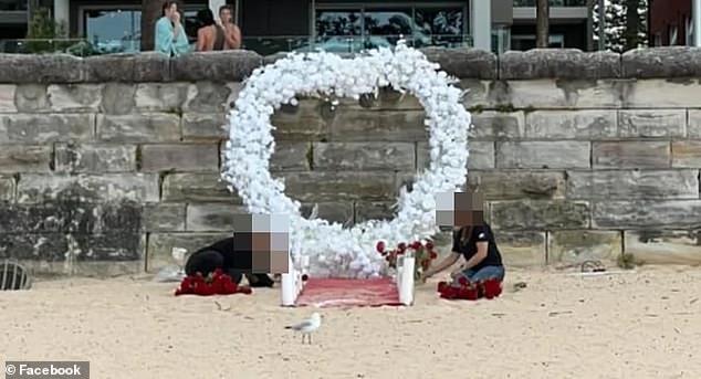 A Valentine's Day proposal has outraged locals after plastic flower petals, candles and plastic packaging were strewn across the beach