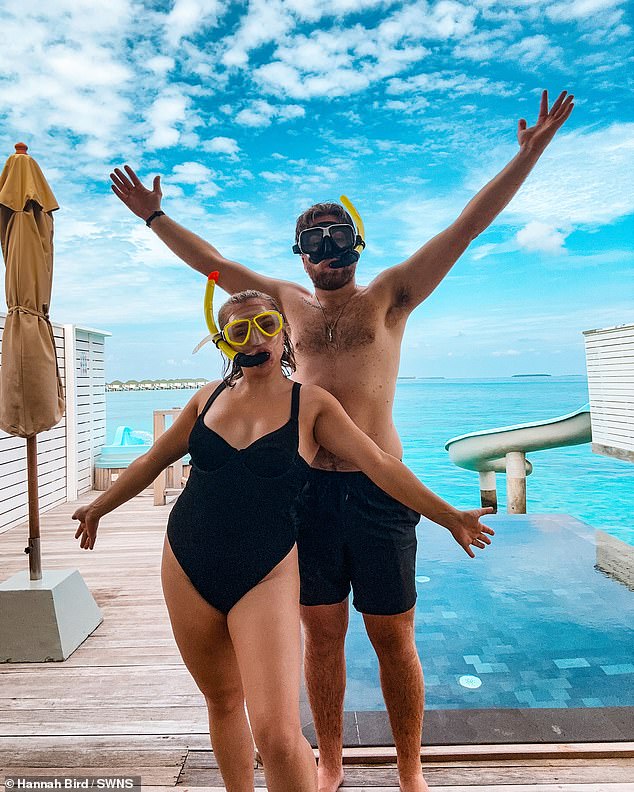 Hannah Bird, 25, from Weston-super-Mare, North Somerset, and her husband Charlie Camper, 24, who go on holiday ten times a year, like to sleep in and say they would rather spend money on memories and be a bit selfish.  ' (pictured in the Maldives)