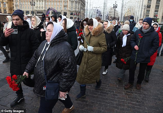 Women of Russian troops sent to fight in Ukraine called for their return during a protest in Moscow on Saturday