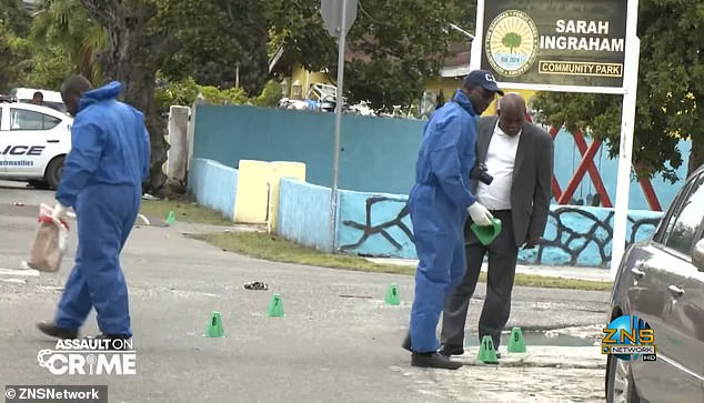 Investigators investigate the scene of a recent murder in the Bahamas.  The archipelago of 400,000 has recorded 25 murders this year, a sharp increase from historical norms