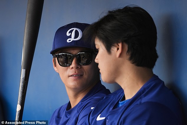 Yamamoto, left, and DH Shohei Ohtani both signed huge contracts with LA this year