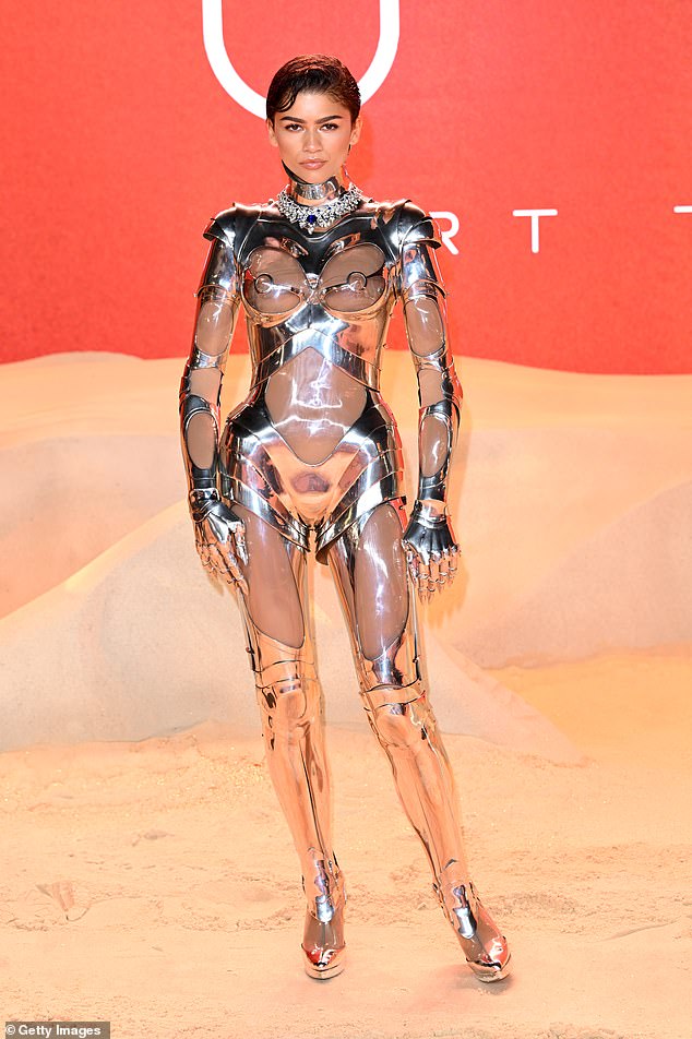 Zendaya, 27, debuted her raciest look yet as she left little to the imagination in a metallic robot suit from the designer archives for the Dune: Part Two premiere in Leicester Square, London on Thursday