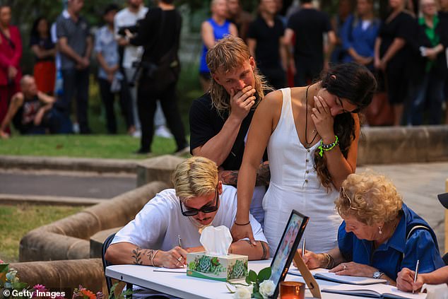 Mourners gathered at the wake (pictured) not far from the Sydney suburb of Paddington, where Mr Baird and Mr Davies were allegedly murdered at a property