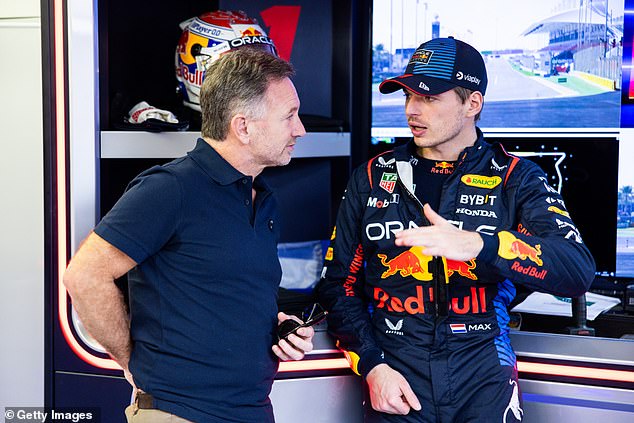 Horner and reigning Formula 1 world champion Max Verstappen in conversation on the Bahrain circuit