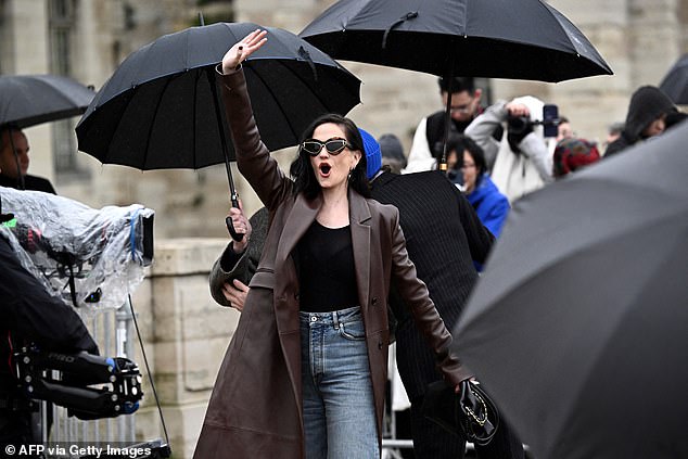 The French actress looked beside herself with excitement as she waved to fans upon arrival