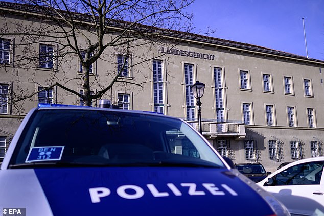 Before the trial begins, a police vehicle is parked outside the regional criminal court.  The mother was arrested in late 2022 after a social worker – reportedly called by the boyfriend – found the boy severely malnourished, comatose and hypothermic.