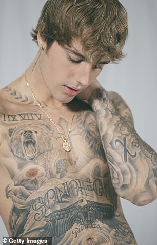 Bieber poses during a studio photo shoot in August 2020 in Los Angeles,