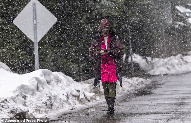 The agency also issued a blizzard-like condition advisory for the Greater Lake Tahoe Area, including the cities of Stateline, Markleeville, Incline Village, Tahoe City, Glenbrook, Truckee and South Lake Tahoe (pictured Thursday in El Dorado County, California)