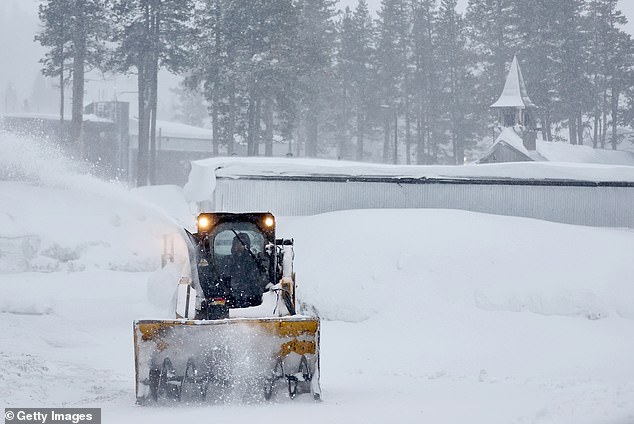 The NWS said Thursday that strong winds had already caused damage around the Lake Tahoe area, and even stronger winds with gusts up to 80 mph were expected today (Kingvale, California pictured Thursday)