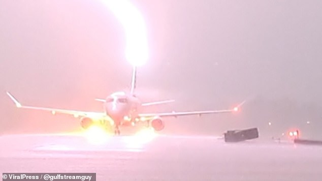 The insurance company pays out about a billion dollars annually for lightning damage claims (above, lightning strikes an American Eagle plane full of passengers in Arkansas)