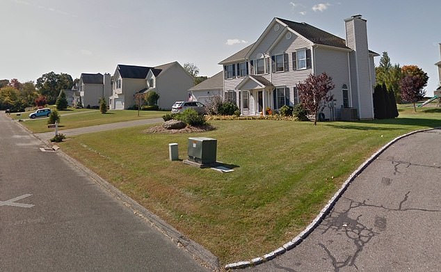 Houses pictured on a street in New Milford, Connecticut, about a two-hour drive from New York City