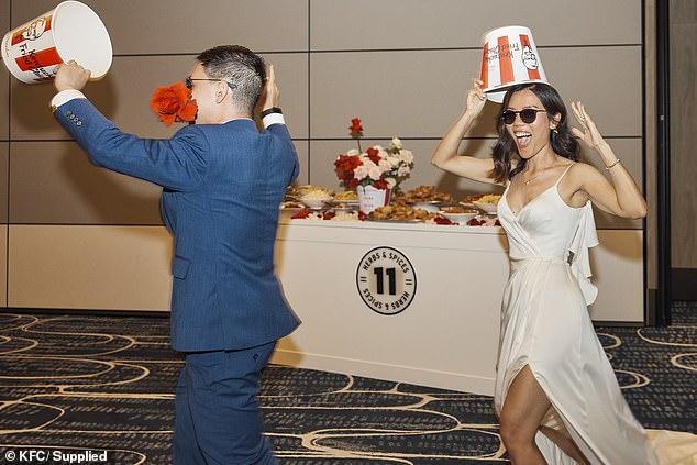 The couple said the wedding was a hit with their guests, who loved the KFC merchandise and personalized buckets