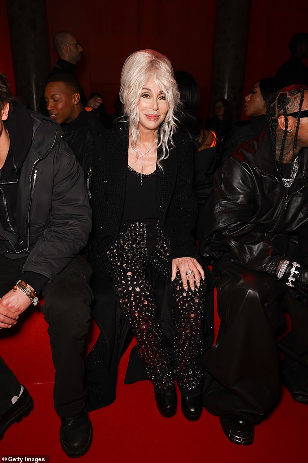 Cher took her seat in the star-studded front row