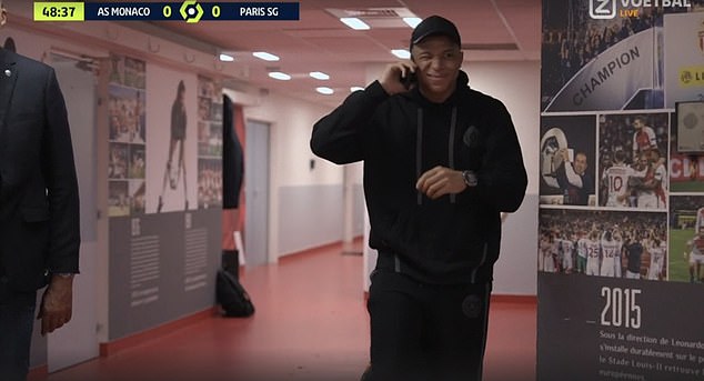 Mbappé, who will leave PSG this summer, was seen on the phone in the tunnel at the start of the second period